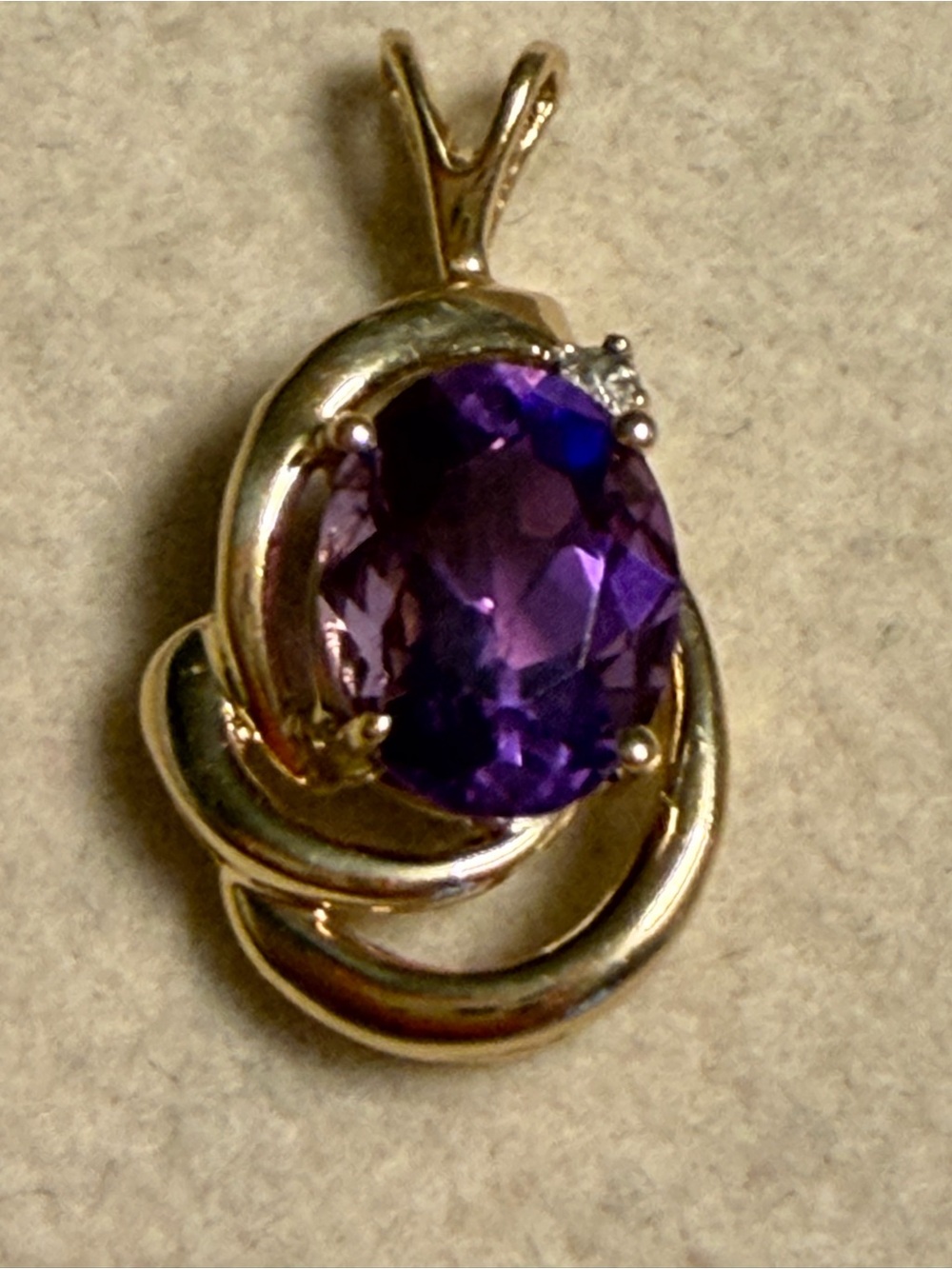 10k Gold Pendant with Oval Purple Amethyst and Accent Diamond